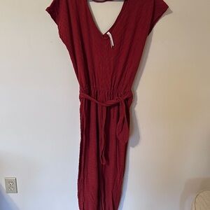 Anthropologie Red Wrap Jumpsuit with V-neck and Cap Sleeves
